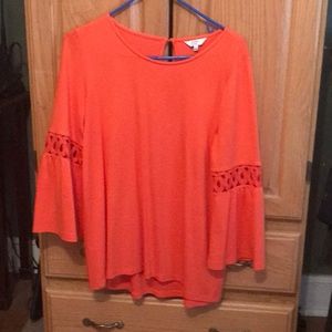 Beautiful and flattering top.